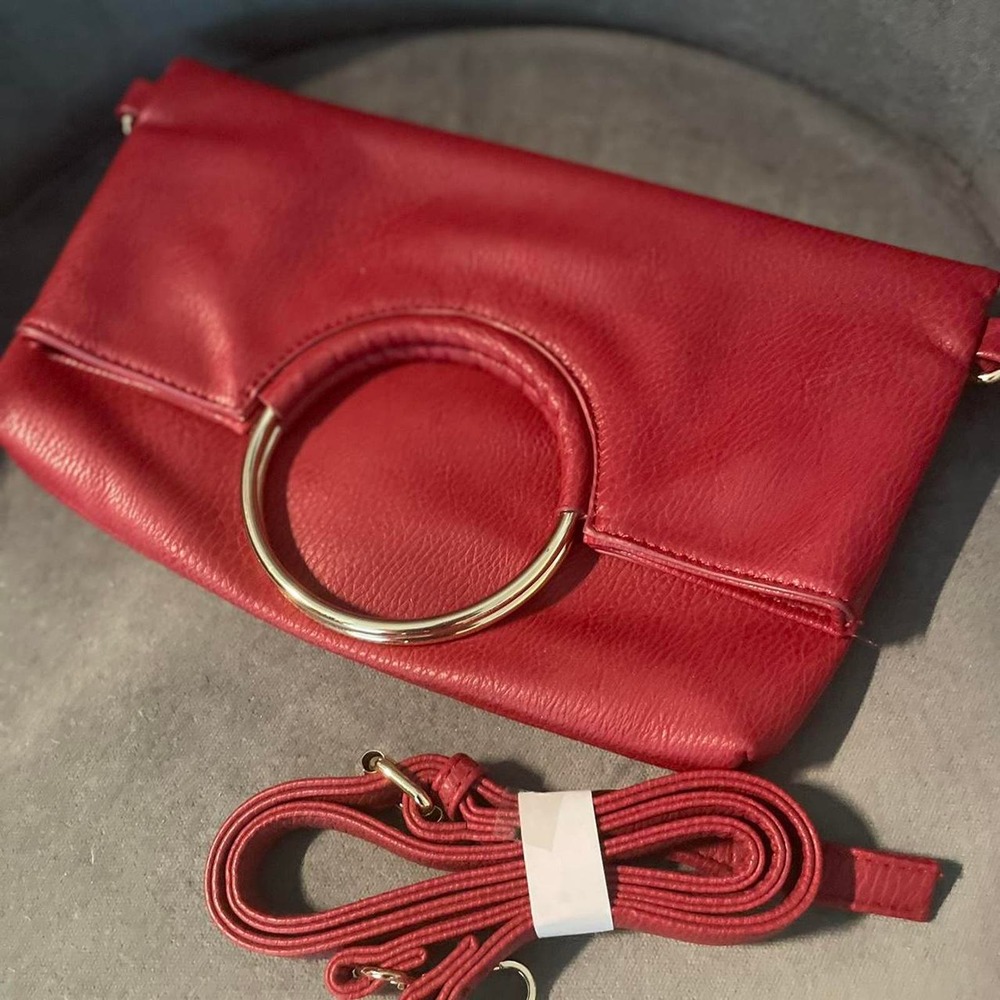 Burgundy clutch with gold hardware